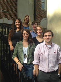 Six University of Alabama students standing on staircase