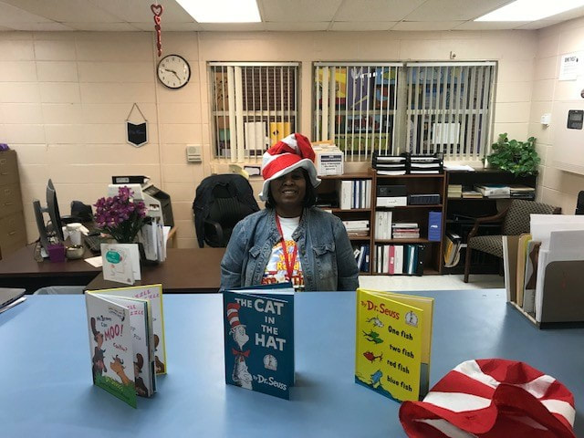 Kinterbish Junior High School, Sumter County librarian showing Dr. Seuss donated