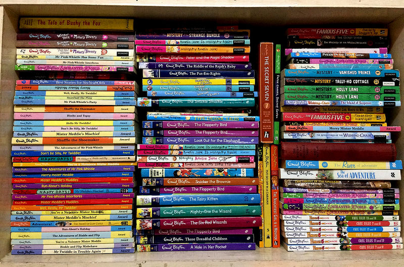 Photo of stacks of elementary books in a library